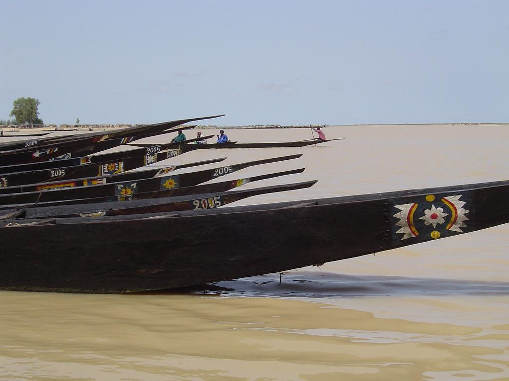 Pirogues line the shores in Mopti - one end point to most river trips
