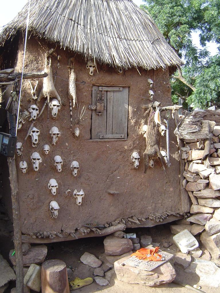 A Dogon hunter displays his prowess on his home